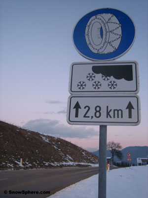 snow chain road sign